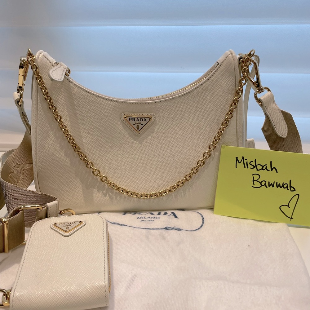 Prada Re-edition 2005 Saffiano Leather Bag. White w/gold hardware. Beige strap.